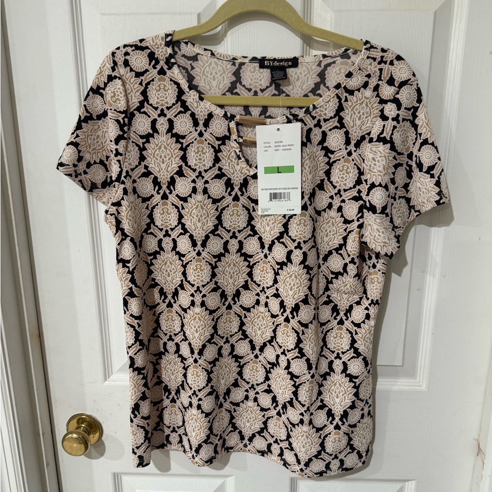 A By Design-Black and Cream Patterned Blouse for a versatile wardrobe.